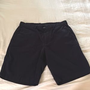 Men’s Uniqlo shorts, true navy. Has 2 functional pockets at the back.